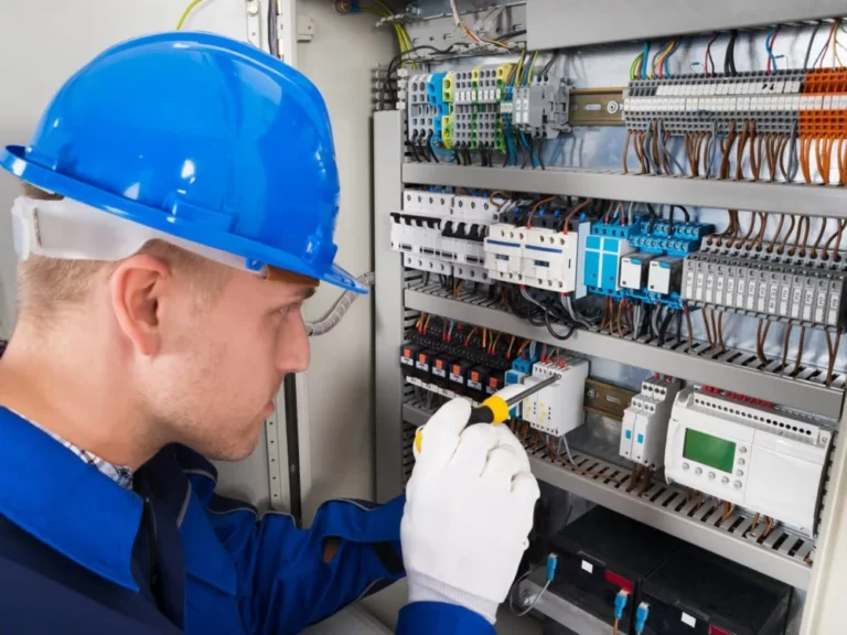Electrician working on a switchboard