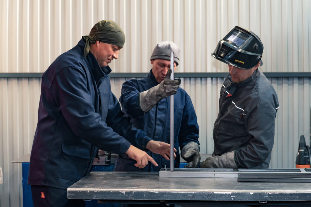 Workers in a steel workshop