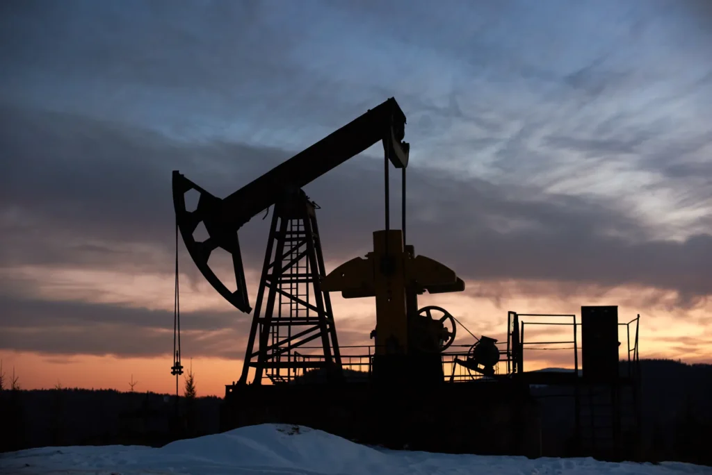Oil pumpjack at sunset