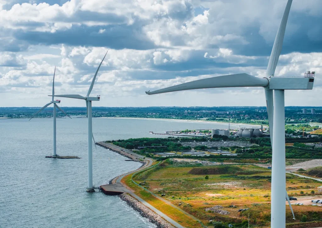 Offshore wind turbines along a coastline